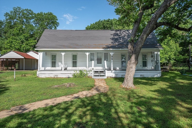 1498 Fm 279, Ben Wheeler, TX 75754 - view of front facade featuring covered porch, a carport, and a front lawn