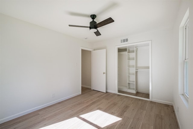 9419 Campbell Rd, Houston, TX 77080 - unfurnished bedroom featuring light wood-style floors, a closet, and baseboards