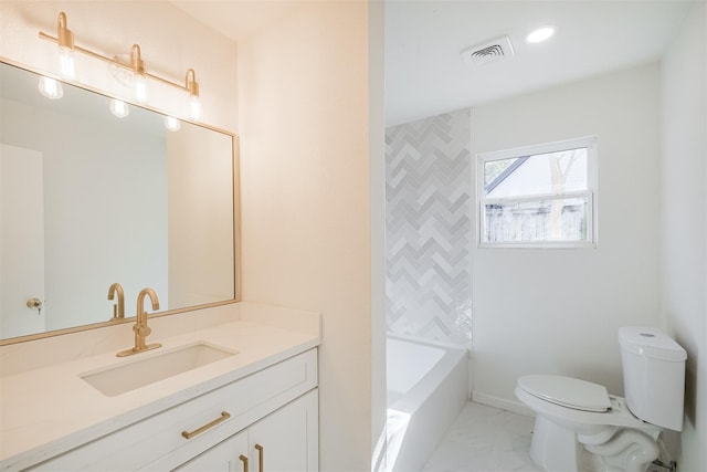 9419 Campbell Rd, Houston, TX 77080 - bathroom with toilet, marble look tiles, and vanity