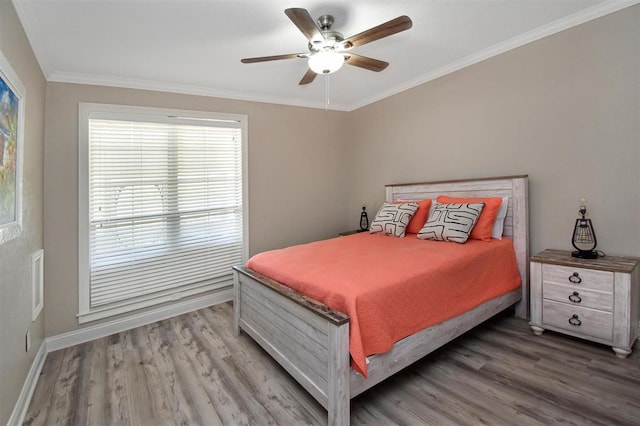 27140 Fm 365, Beaumont, TX 77705 - bedroom featuring light wood-type flooring, crown molding, baseboards, and ceiling fan