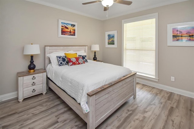 27140 Fm 365, Beaumont, TX 77705 - bedroom with baseboards, crown molding, light wood-style flooring, and multiple windows