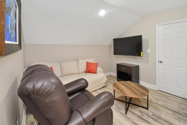 27140 Fm 365, Beaumont, TX 77705 - living room with lofted ceiling, light wood-style floors, baseboards, and recessed lighting