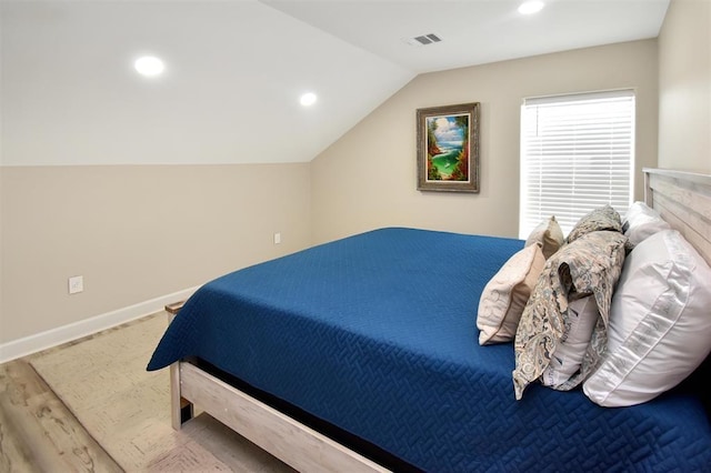 27140 Fm 365, Beaumont, TX 77705 - bedroom with wood finished floors, lofted ceiling, recessed lighting, and baseboards
