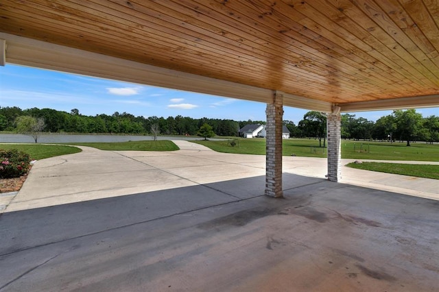27140 Fm 365, Beaumont, TX 77705 - view of patio / terrace featuring a water view and view of scattered trees
