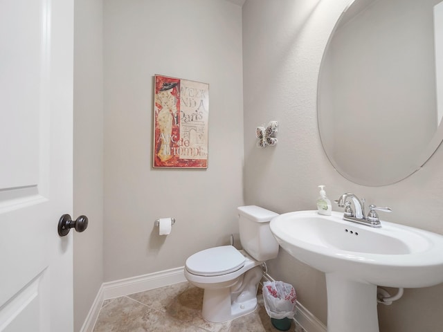 5411 Cedar Elm Ln, Fulshear, TX 77441 - bathroom featuring toilet, a sink, tile patterned floors, and baseboards