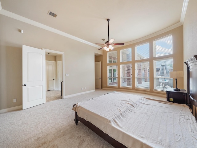 5411 Cedar Elm Ln, Fulshear, TX 77441 - bedroom with ornamental molding, light carpet, and baseboards