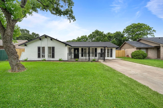 12310 New Brunswick Dr, Houston, TX 77089 - mid-century modern home with concrete driveway and brick siding