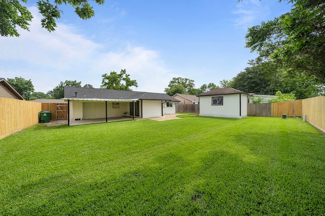 12310 New Brunswick Dr, Houston, TX 77089 - rear view of house featuring a patio and an outbuilding