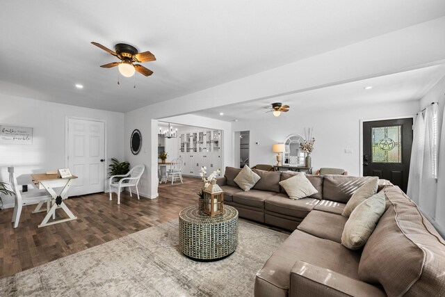729 Kyle St, Angleton, TX 77515 - living room featuring ceiling fan, a chandelier, wood finished floors, recessed lighting, and baseboards