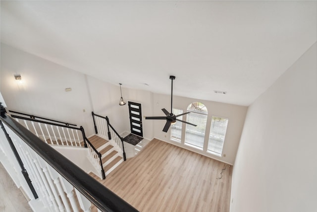 13038 Skymeadow Dr, Houston, TX 77082 - stairs with wood finished floors and ceiling fan