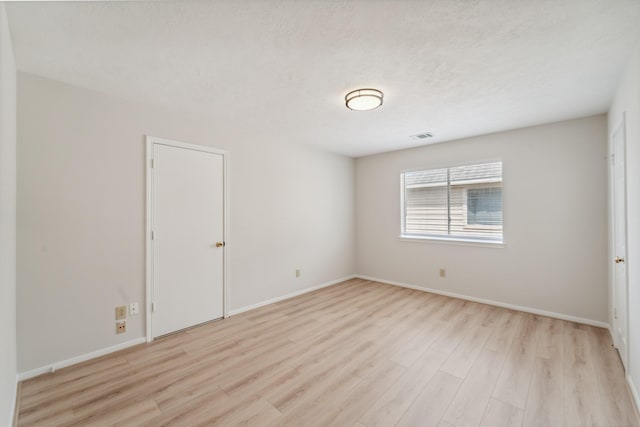 13038 Skymeadow Dr, Houston, TX 77082 - spare room featuring light wood finished floors and baseboards