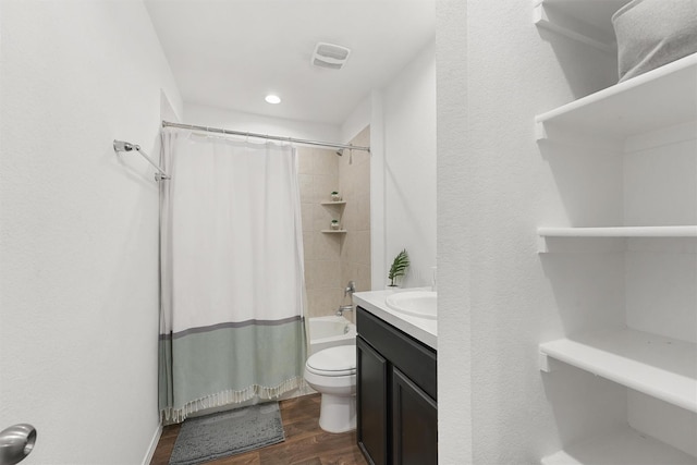 5159 Cherry Tallow Trl, Katy, TX 77449 - full bath featuring wood finished floors, toilet, shower / tub combo with curtain, vanity, and recessed lighting