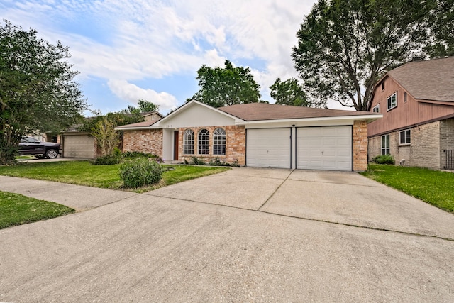 3247 Bolton Gardens Dr, Houston, TX 77066 - single story home featuring a garage, concrete driveway, brick siding, and a front lawn