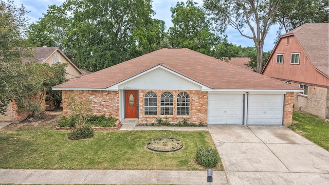 3247 Bolton Gardens Dr, Houston, TX 77066 - view of front of home featuring a garage, brick siding, driveway, a front yard, and roof with shingles