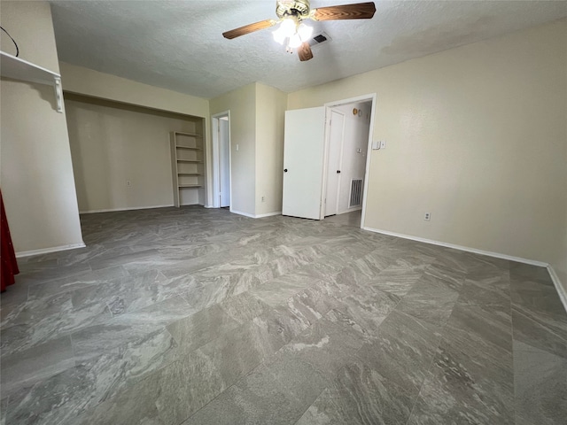 2134 Collingsfield Dr, Sugar Land, TX 77478 - unfurnished bedroom with a textured ceiling, baseboards, a closet, and a ceiling fan