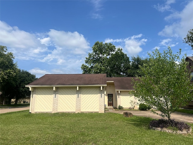 2134 Collingsfield Dr, Sugar Land, TX 77478 - view of front of property with a front lawn, brick siding, and roof with shingles