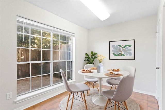 10345 Longmont Dr, Houston, TX 77042 - dining area featuring baseboards