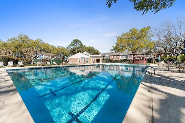 10345 Longmont Dr, Houston, TX 77042 - community pool with a patio area