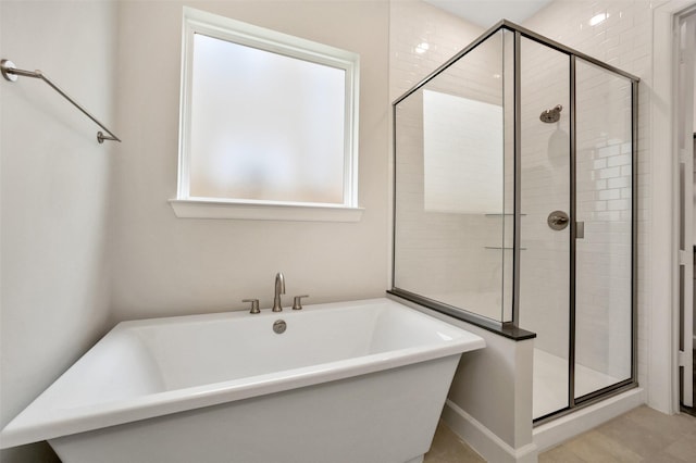 2517 S Houston Ave, Pearland, TX 77581 - bathroom featuring a freestanding tub and a shower stall