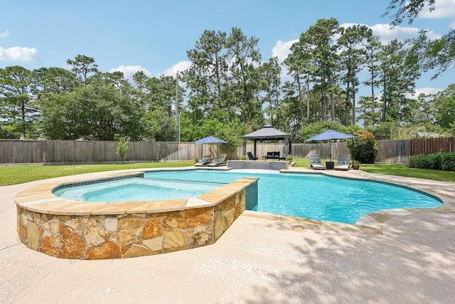 12106 Via Chianti Ct, Cypress, TX 77429 - view of pool with a gazebo, a patio, a fenced backyard, and a pool with connected hot tub