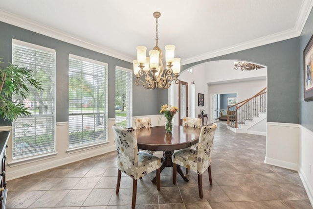 12106 Via Chianti Ct, Cypress, TX 77429 - dining area with plenty of natural light, a chandelier, crown molding, and arched walkways