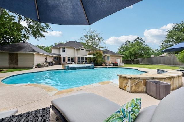 12106 Via Chianti Ct, Cypress, TX 77429 - view of swimming pool featuring a patio area, a fenced backyard, and a pool with connected hot tub