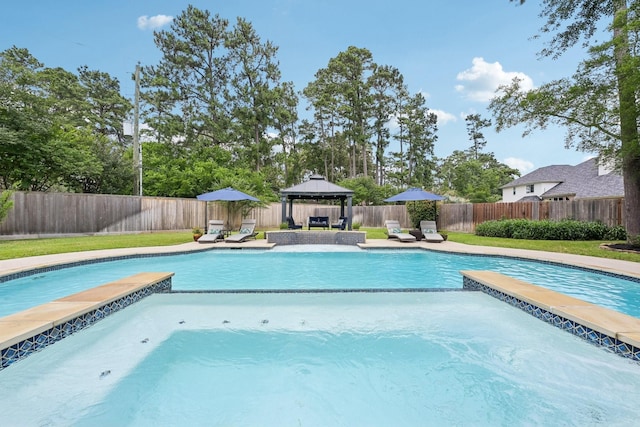 12106 Via Chianti Ct, Cypress, TX 77429 - view of pool with a gazebo, a pool with connected hot tub, a fenced backyard, and a patio