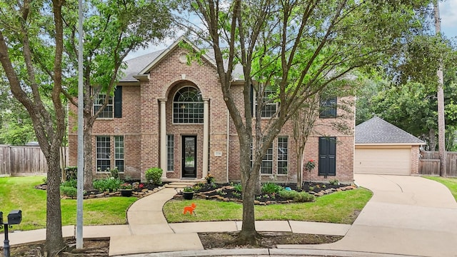 12106 Via Chianti Ct, Cypress, TX 77429 - traditional-style house with brick siding, a garage, and a shingled roof