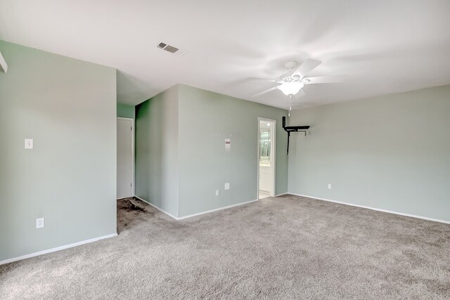3920 Blackberry Ln, Port Arthur, TX 77642 - carpeted empty room featuring a ceiling fan and baseboards