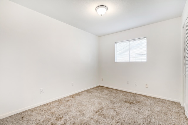 3920 Blackberry Ln, Port Arthur, TX 77642 - empty room with carpet floors and baseboards
