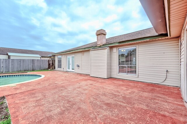 3920 Blackberry Ln, Port Arthur, TX 77642 - view of pool featuring a patio and french doors