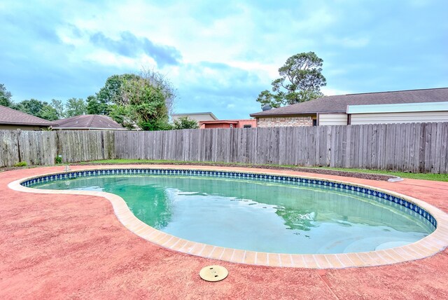 3920 Blackberry Ln, Port Arthur, TX 77642 - view of swimming pool with a fenced backyard