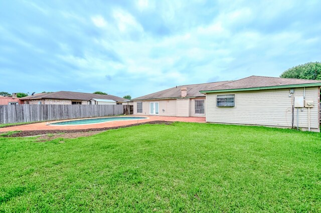3920 Blackberry Ln, Port Arthur, TX 77642 - rear view of property with a patio