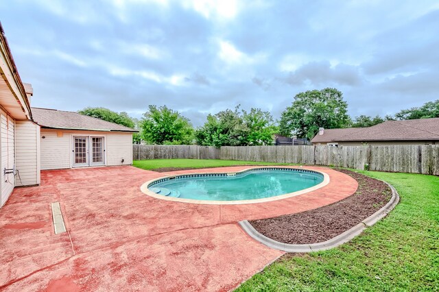 3920 Blackberry Ln, Port Arthur, TX 77642 - view of pool with french doors and a patio
