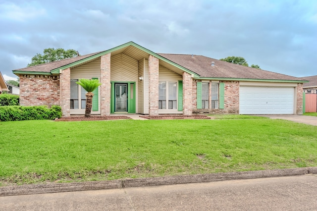 3920 Blackberry Ln, Port Arthur, TX 77642 - mid-century modern home featuring an attached garage, brick siding, driveway, a front lawn, and roof with shingles
