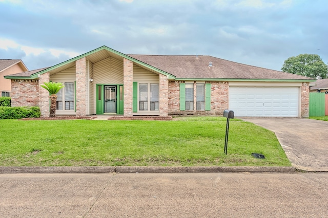 3920 Blackberry Ln, Port Arthur, TX 77642 - mid-century modern home with concrete driveway, a front yard, brick siding, an attached garage, and a shingled roof