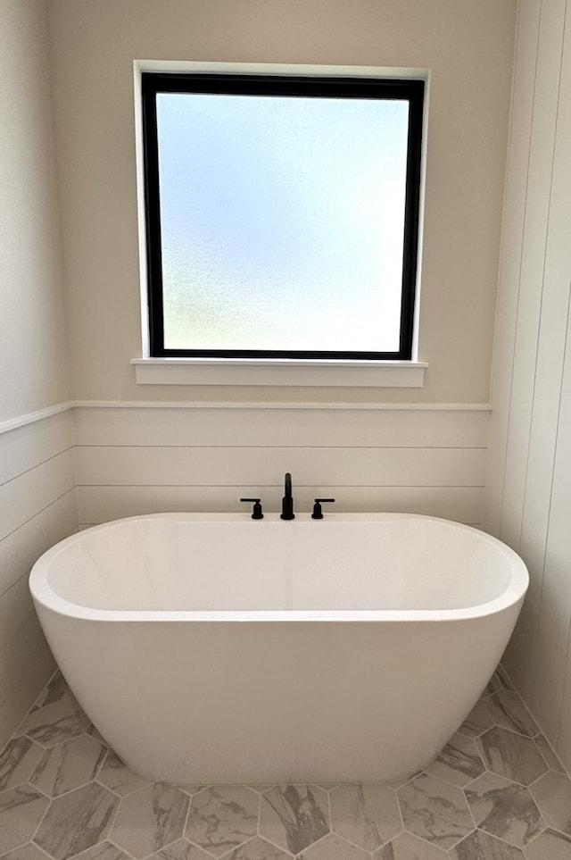 8256 Cavell Ct, Montgomery, TX 77316 - full bath with marble finish floors and a freestanding tub