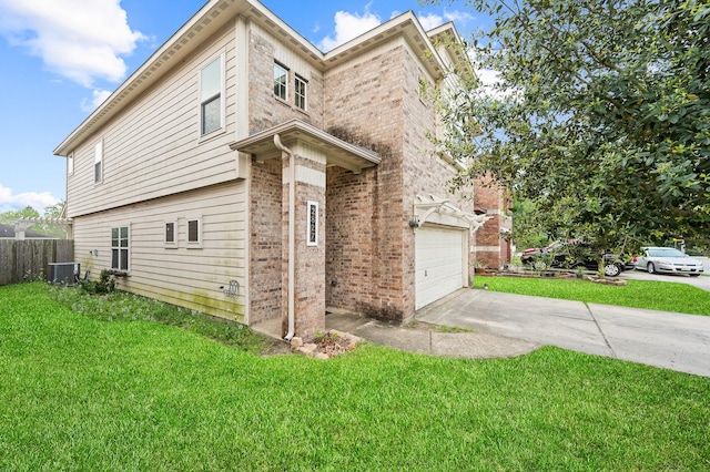 2827 Arica Ln, Spring, TX 77373 - view of property exterior with central AC, brick siding, concrete driveway, and an attached garage