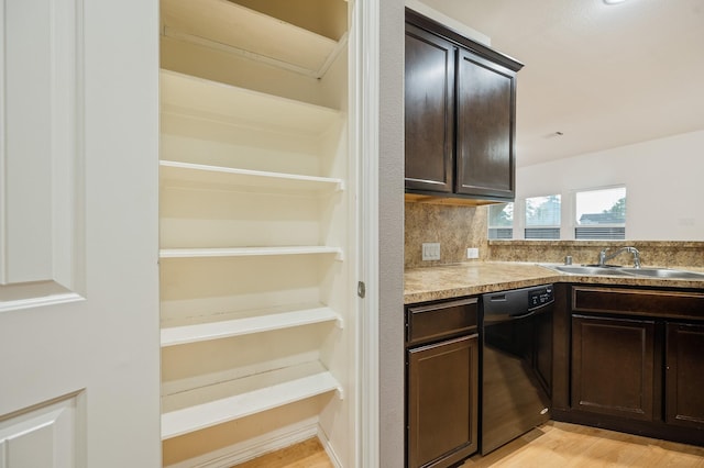 2827 Arica Ln, Spring, TX 77373 - kitchen with dishwasher, a sink, dark brown cabinets, and light wood-type flooring