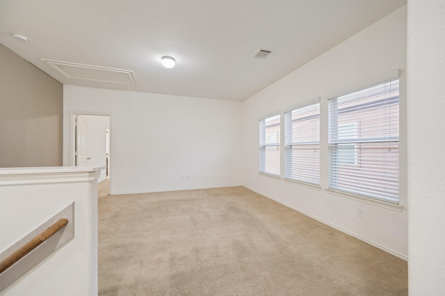 2827 Arica Ln, Spring, TX 77373 - unfurnished room with attic access, light carpet, baseboards, and a smoke detector