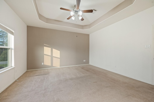 2827 Arica Ln, Spring, TX 77373 - carpeted spare room featuring ceiling fan, a raised ceiling, and baseboards