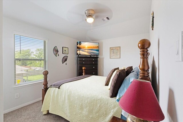 1685 Rd 5102, Cleveland, TX 77327 - carpeted bedroom with baseboards and a ceiling fan