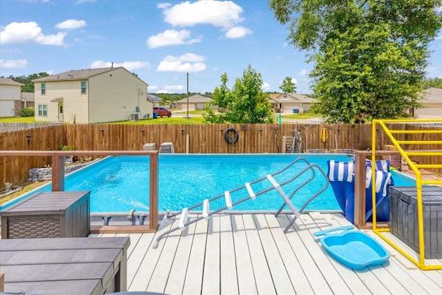 1685 Rd 5102, Cleveland, TX 77327 - view of swimming pool featuring a residential view and a deck