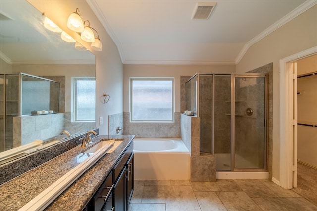 18423 Weeping Spring Dr, Cypress, TX 77429 - full bathroom with a stall shower, ornamental molding, a walk in closet, tile patterned flooring, and vanity