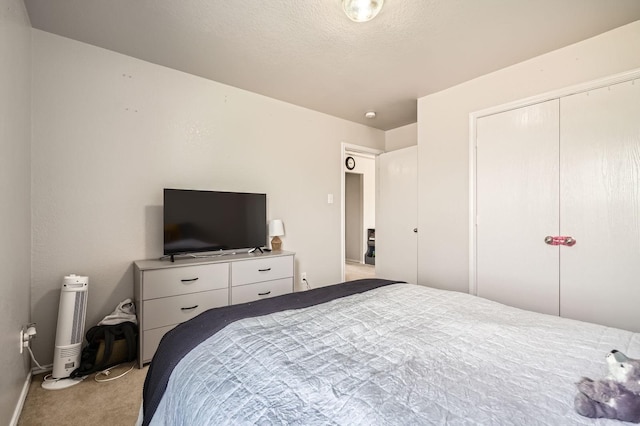 503 Savory Ln, Crosby, TX 77532 - carpeted bedroom featuring a closet and baseboards
