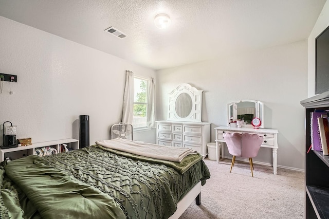 503 Savory Ln, Crosby, TX 77532 - bedroom featuring light carpet and a textured ceiling