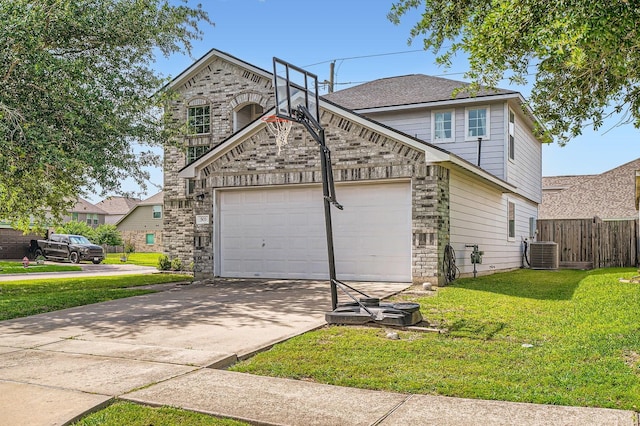 503 Savory Ln, Crosby, TX 77532 - view of front of house featuring a garage, concrete driveway, stone siding, and central AC