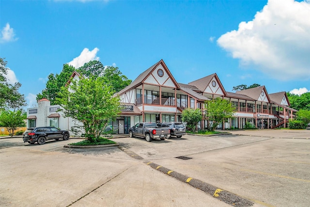 804 W Dallas St Unit 5, Conroe, TX 77301 - view of building exterior with uncovered parking