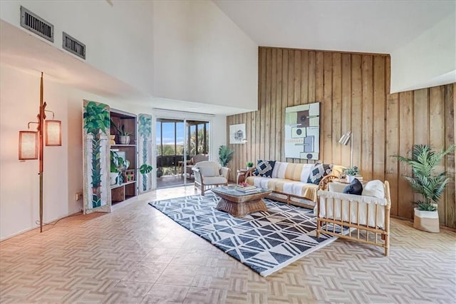 635 Lantana Dr, Port Aransas, TX 78373 - living area with wood walls and high vaulted ceiling