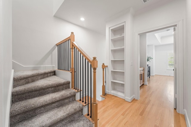 26 Riva Row, The Woodlands, TX 77380 - stairs featuring wood finished floors, baseboards, and recessed lighting